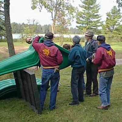 Volunteers installing playground