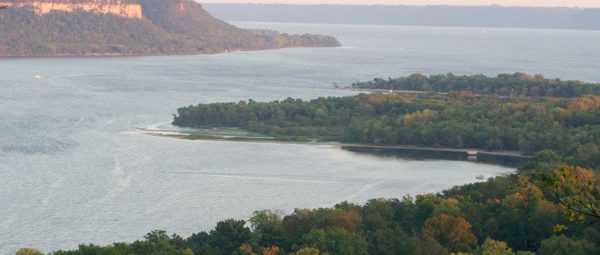 forested foreground with Lake Pepin center