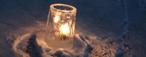 candle within an ice holder