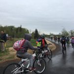 Kids take off by bike on the newly opened paved trail