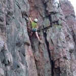 rock climber on rock wall
