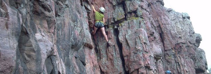 rock climber on rock wall