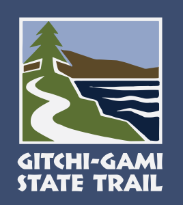 logo with a tree, trail, and water