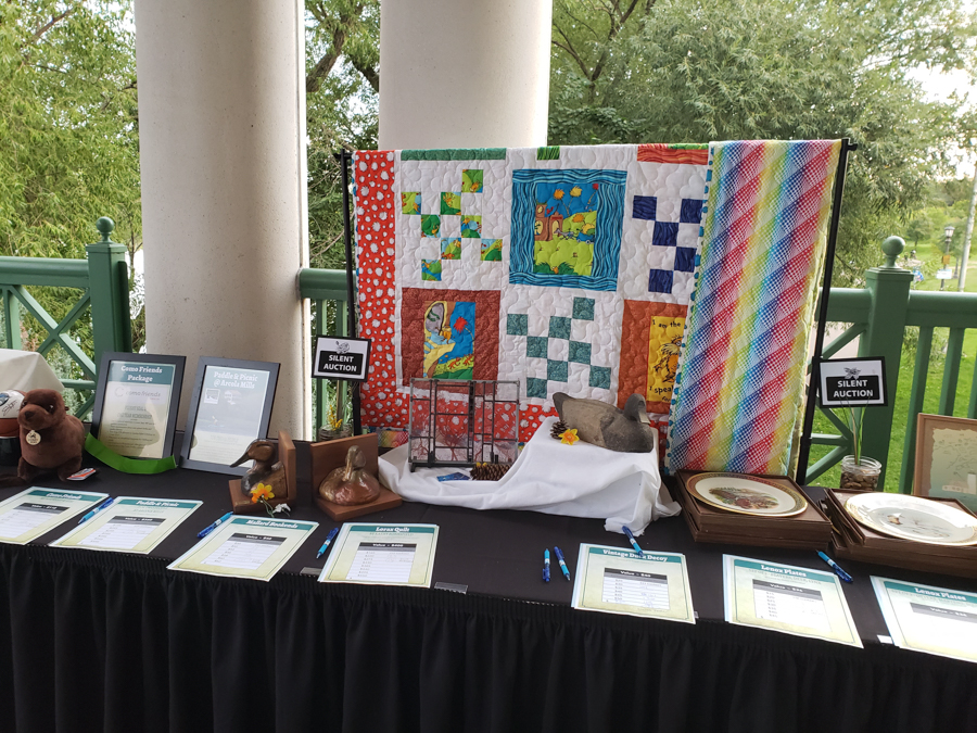 Colorful quilt and other items on display