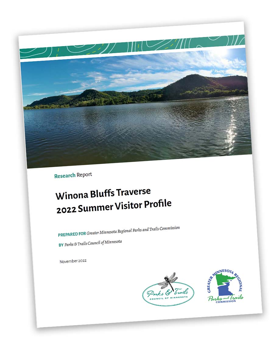Cover of a Research Report shows lake with hills in distance