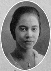 Black and white headshot of woman