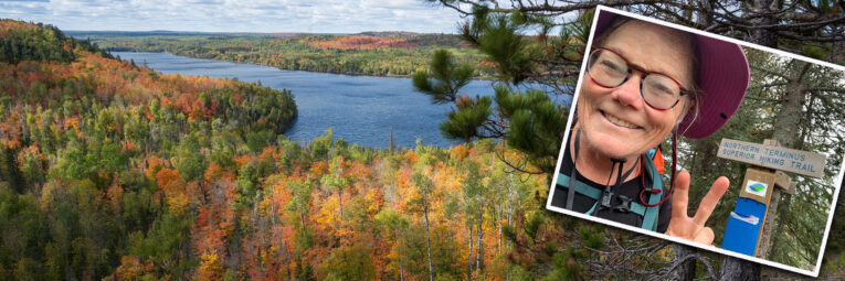 Scenic view of forest and lake overlaid with postcard of woman giving the peace sign near a trail sign