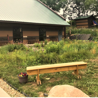 nature center with garden and bench