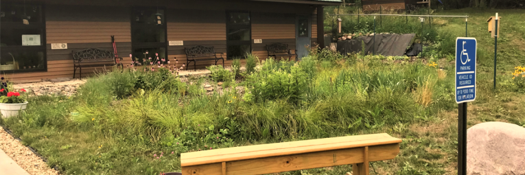 nature center with garden and bench