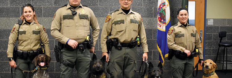 DNR conservation officers and their K-9 partners