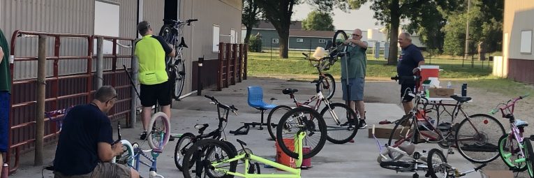 Volunteers fix multiple bicycles