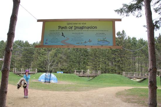Natural playground entrance sign